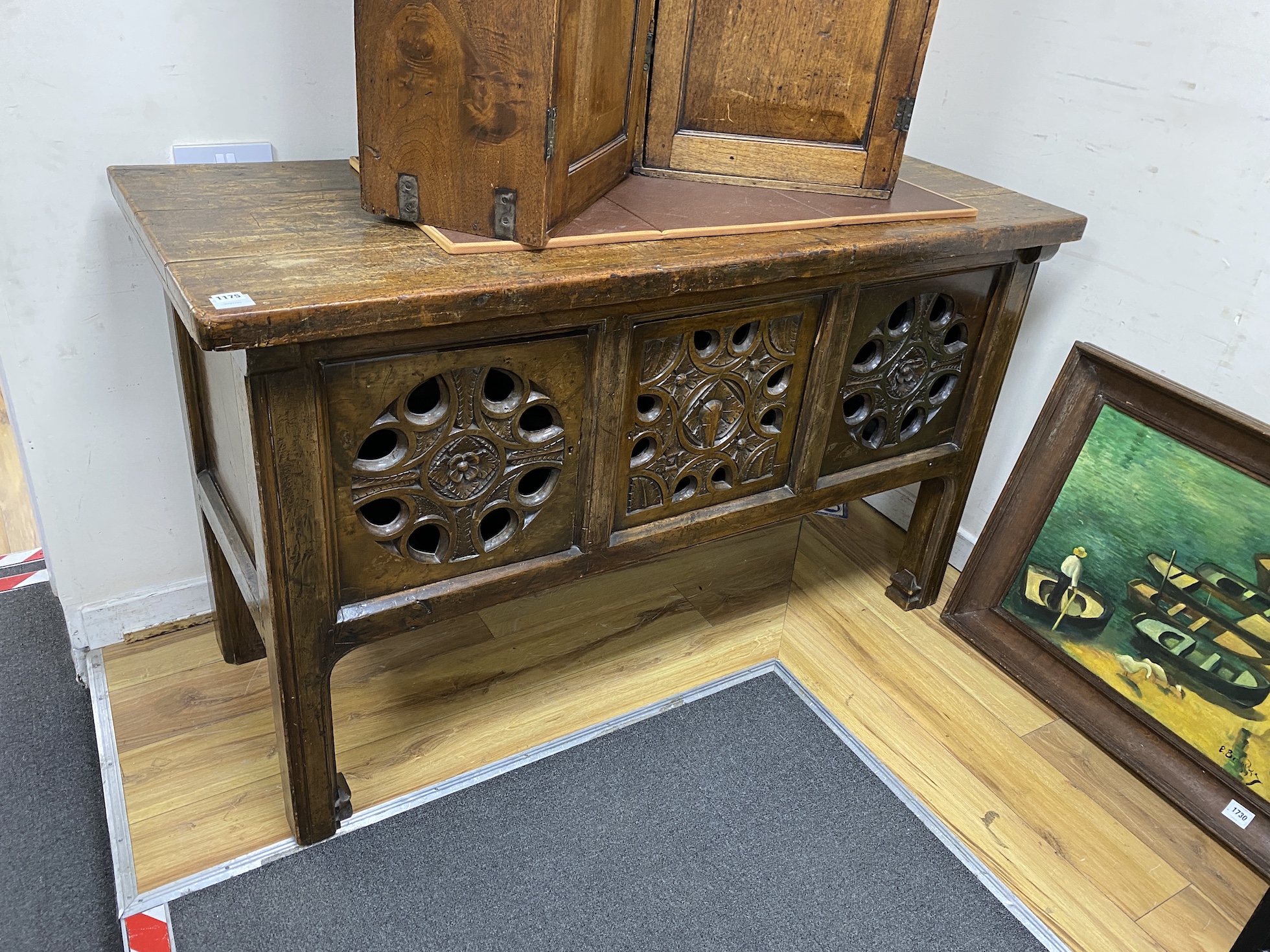 A 17th century style Continental carved walnut serving table, length 155cm, depth 62cm, height 90cm